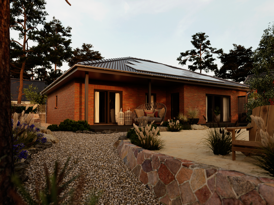 Bungalow 128 Gartenansicht mit Klinkerfassade in Spreeland Bungalow 128 mit heller Spreeland-Klinkerfassade, großzügiger Terrassenbereich und geschwungener Kiesweg